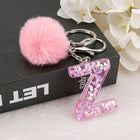 Llavero a crochet paso a paso con pompón glitter y letras doradas – Bag Charm Premium