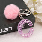 Llavero a crochet paso a paso con pompón glitter y letras doradas – Bag Charm Premium