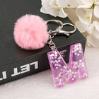 Llavero a crochet paso a paso con pompón glitter y letras doradas – Bag Charm Premium