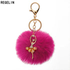Llavero con Peluche de Conejito Bailarín - Pompón de Piel Sintética Suave, Regalo Elegante para Muje