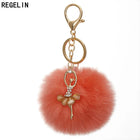 Llavero con Peluche de Conejito Bailarín - Pompón de Piel Sintética Suave, Regalo Elegante para Muje