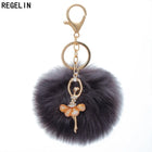 Llavero con Peluche de Conejito Bailarín - Pompón de Piel Sintética Suave, Regalo Elegante para Muje
