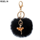 Llavero con Peluche de Conejito Bailarín - Pompón de Piel Sintética Suave, Regalo Elegante para Muje