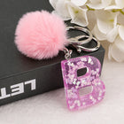 Llavero a crochet paso a paso con pompón glitter y letras doradas – Bag Charm Premium