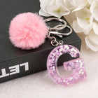 Llavero a crochet paso a paso con pompón glitter y letras doradas – Bag Charm Premium