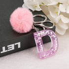 Llavero a crochet paso a paso con pompón glitter y letras doradas – Bag Charm Premium