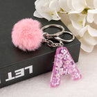 Llavero a crochet paso a paso con pompón glitter y letras doradas – Bag Charm Premium