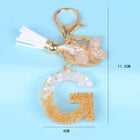 Llaveros Originales para Coche - Elegancia Blanca con Iniciales y Borla de Mariposa