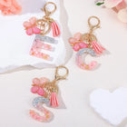 Bag Charm Personalizado: Llavero Letra Inicial Rosa con Colgante Mariposa - Accesorio Premium para B