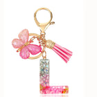 Bag Charm Personalizado: Llavero Letra Inicial Rosa con Colgante Mariposa - Accesorio Premium para B
