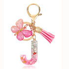 Bag Charm Personalizado: Llavero Letra Inicial Rosa con Colgante Mariposa - Accesorio Premium para B