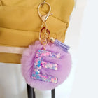 Llavero con Peluche de Letra Inicial y Pompón Morado - Glitter Resina