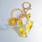 Llavero para moteros con inicial personalizada - Girasol amarillo fashion premium