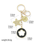 Bag Charm Premium de Trébol de 4 Hojas con Flor de Cristal - Llavero Elegante para Bolso
