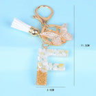 Llaveros Originales para Coche - Elegancia Blanca con Iniciales y Borla de Mariposa