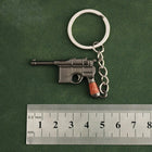 Mini Cámara Llavero Metálico - Colección de Armas Anime Premium para Fiestas y Mochileros
