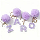 Llavero con Peluche de Letra Inicial y Pompón Morado - Glitter Resina