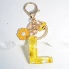 Llavero para moteros con inicial personalizada - Girasol amarillo fashion premium