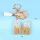 Llaveros Originales para Coche - Elegancia Blanca con Iniciales y Borla de Mariposa