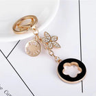 Bag Charm Premium de Trébol de 4 Hojas con Flor de Cristal - Llavero Elegante para Bolso
