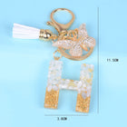 Llaveros Originales para Coche - Elegancia Blanca con Iniciales y Borla de Mariposa