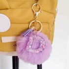 Llavero con Peluche de Letra Inicial y Pompón Morado - Glitter Resina