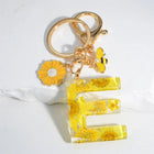 Llavero para moteros con inicial personalizada - Girasol amarillo fashion premium