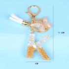 Llaveros Originales para Coche - Elegancia Blanca con Iniciales y Borla de Mariposa