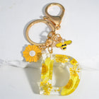 Llavero para moteros con inicial personalizada - Girasol amarillo fashion premium