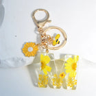 Llavero para moteros con inicial personalizada - Girasol amarillo fashion premium