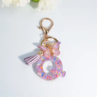 Llaveros Charms Letras A-Z con Colgante Mariposa y Borla - Accesorio Premium para Bolsos