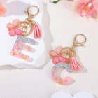 Bag Charm Personalizado: Llavero Letra Inicial Rosa con Colgante Mariposa - Accesorio Premium para B