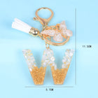 Llaveros Originales para Coche - Elegancia Blanca con Iniciales y Borla de Mariposa