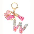 Bag Charm Personalizado: Llavero Letra Inicial Rosa con Colgante Mariposa - Accesorio Premium para B