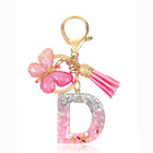 Bag Charm Personalizado: Llavero Letra Inicial Rosa con Colgante Mariposa - Accesorio Premium para B