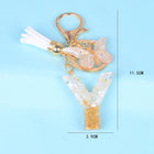 Llaveros Originales para Coche - Elegancia Blanca con Iniciales y Borla de Mariposa