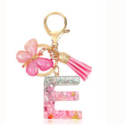 Bag Charm Personalizado: Llavero Letra Inicial Rosa con Colgante Mariposa - Accesorio Premium para B