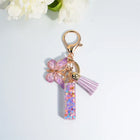 Llaveros Charms Letras A-Z con Colgante Mariposa y Borla - Accesorio Premium para Bolsos