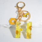 Llavero para moteros con inicial personalizada - Girasol amarillo fashion premium