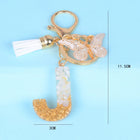 Llaveros Originales para Coche - Elegancia Blanca con Iniciales y Borla de Mariposa