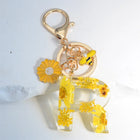 Llavero para moteros con inicial personalizada - Girasol amarillo fashion premium