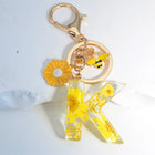 Llavero para moteros con inicial personalizada - Girasol amarillo fashion premium