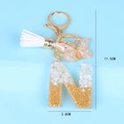 Llaveros Originales para Coche - Elegancia Blanca con Iniciales y Borla de Mariposa