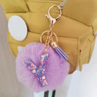 Llavero con Peluche de Letra Inicial y Pompón Morado - Glitter Resina