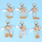 Llaveros Originales para Coche - Elegancia Blanca con Iniciales y Borla de Mariposa