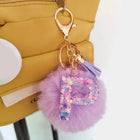 Llavero con Peluche de Letra Inicial y Pompón Morado - Glitter Resina