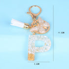 Llaveros Originales para Coche - Elegancia Blanca con Iniciales y Borla de Mariposa