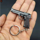 Llavero para Moteros 2025 Pistola Táctica Modelo Aleación 1:4 con Borlas y Caja Transparente - Regal