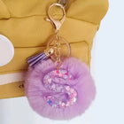 Llavero con Peluche de Letra Inicial y Pompón Morado - Glitter Resina