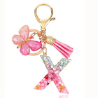 Bag Charm Personalizado: Llavero Letra Inicial Rosa con Colgante Mariposa - Accesorio Premium para B
